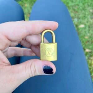 Authentic Louis Vuitton Gold Lock